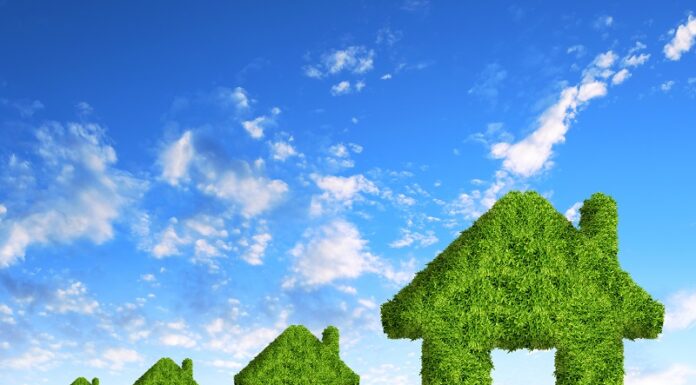 Deka Immobilien setzt auf neueste Technik zur Reduktion von CO₂-Emissionen Grüne Häuser aus Laub, Ilustration