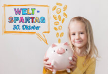 100 Jahre Weltspartag: Warum Sparen nie aus der Mode kommt Mädchen hält ein Sparschwein in den Händen