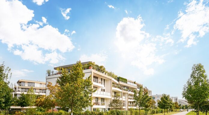 Mehr Stabilität im Depot durch Immobilienfonds? Modernes Wohnviertel